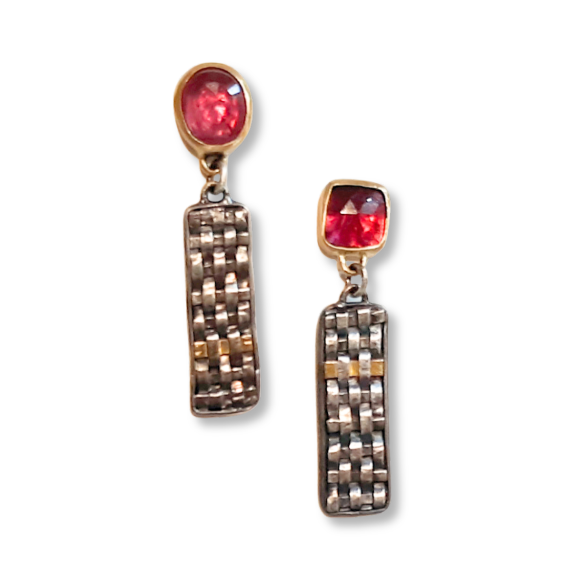 Woven silver/gold rectangles dangling from round/square garnets in 18k gold
