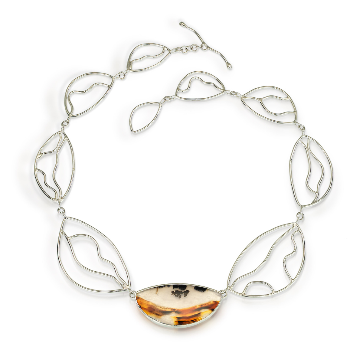 "Sand Dune" - Translucent clear agate with orange waves/black specks