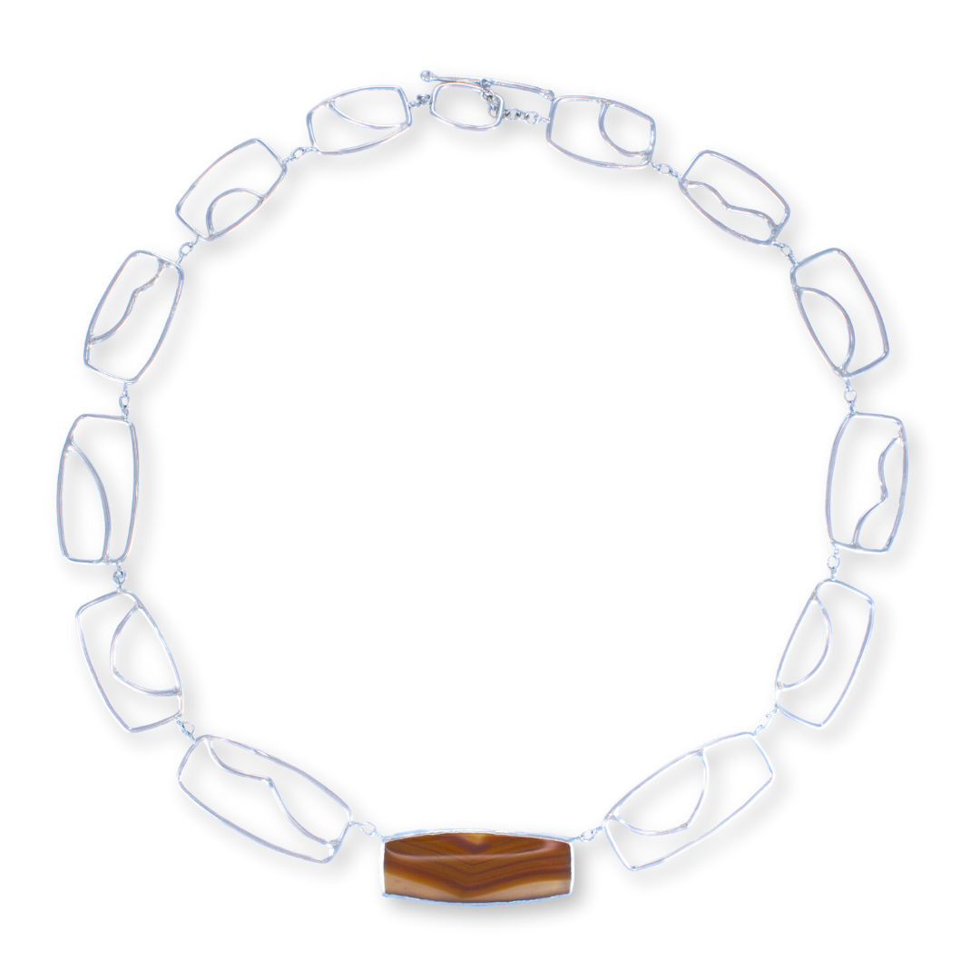 "Sand Dune II" - Translucent clear rectangular agate with orange waves