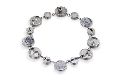 "Tres Rosas" - Sterling Silver Circular Hollow Forms with Ammonite Rounds