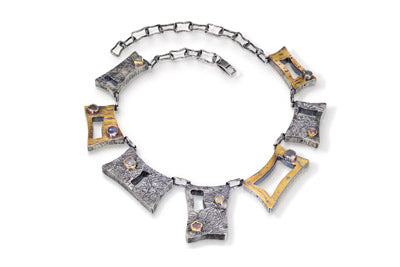 "Nilama Ta'igara (Sapphire Tiger)" - Hollow form necklace with raw sapphires