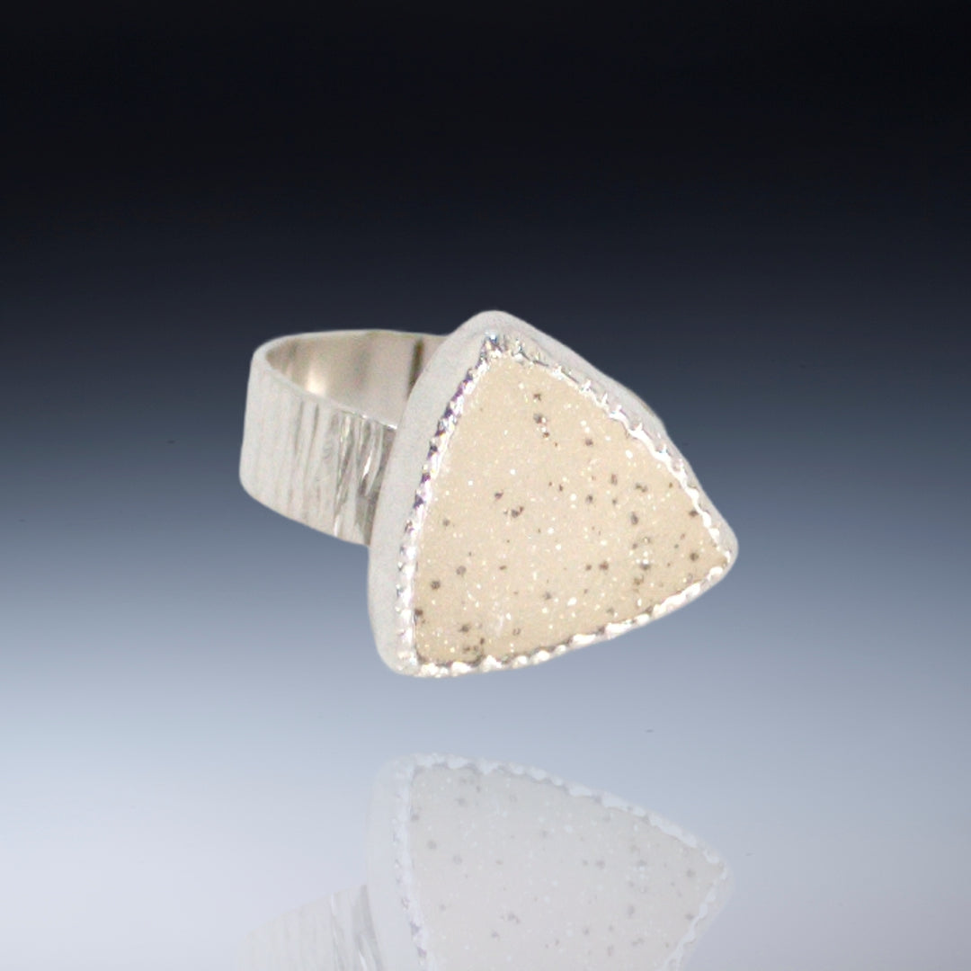 Small white w small speckles triangular drusy on wide band sterling (Size 4)